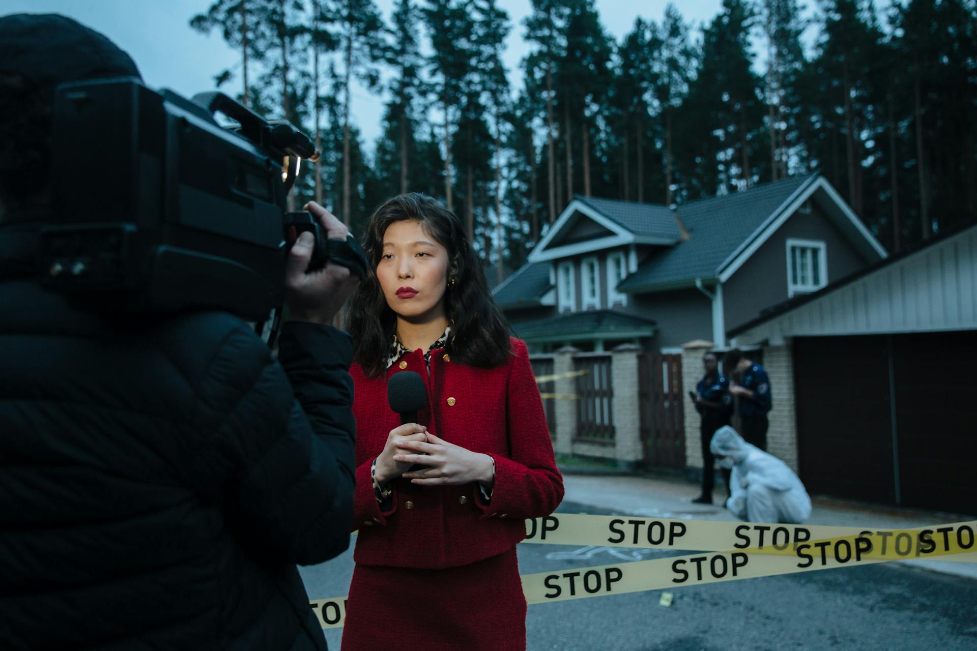 A Woman Holding Microphone while Reporting