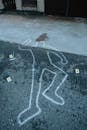 Body Marking on the Pavement of the Crime Scene