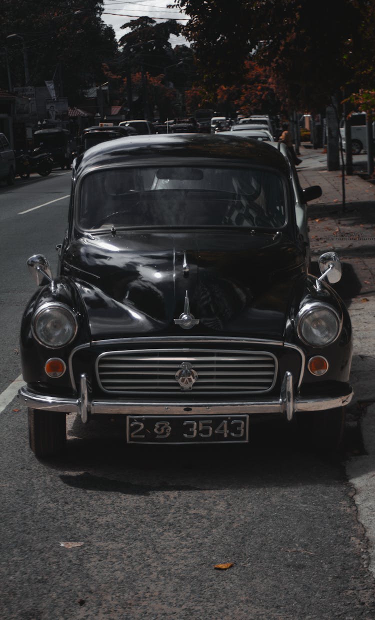 Black Morris Minor Car Parked On The Roadside