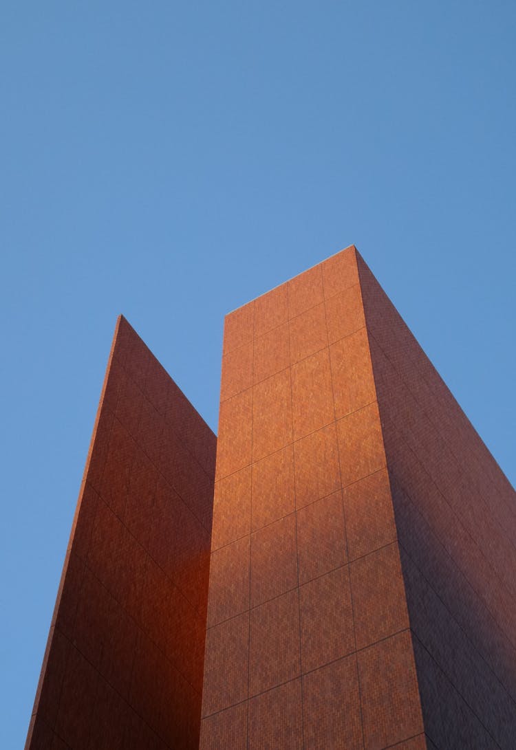 View Of Futuristic Building With Sky Background