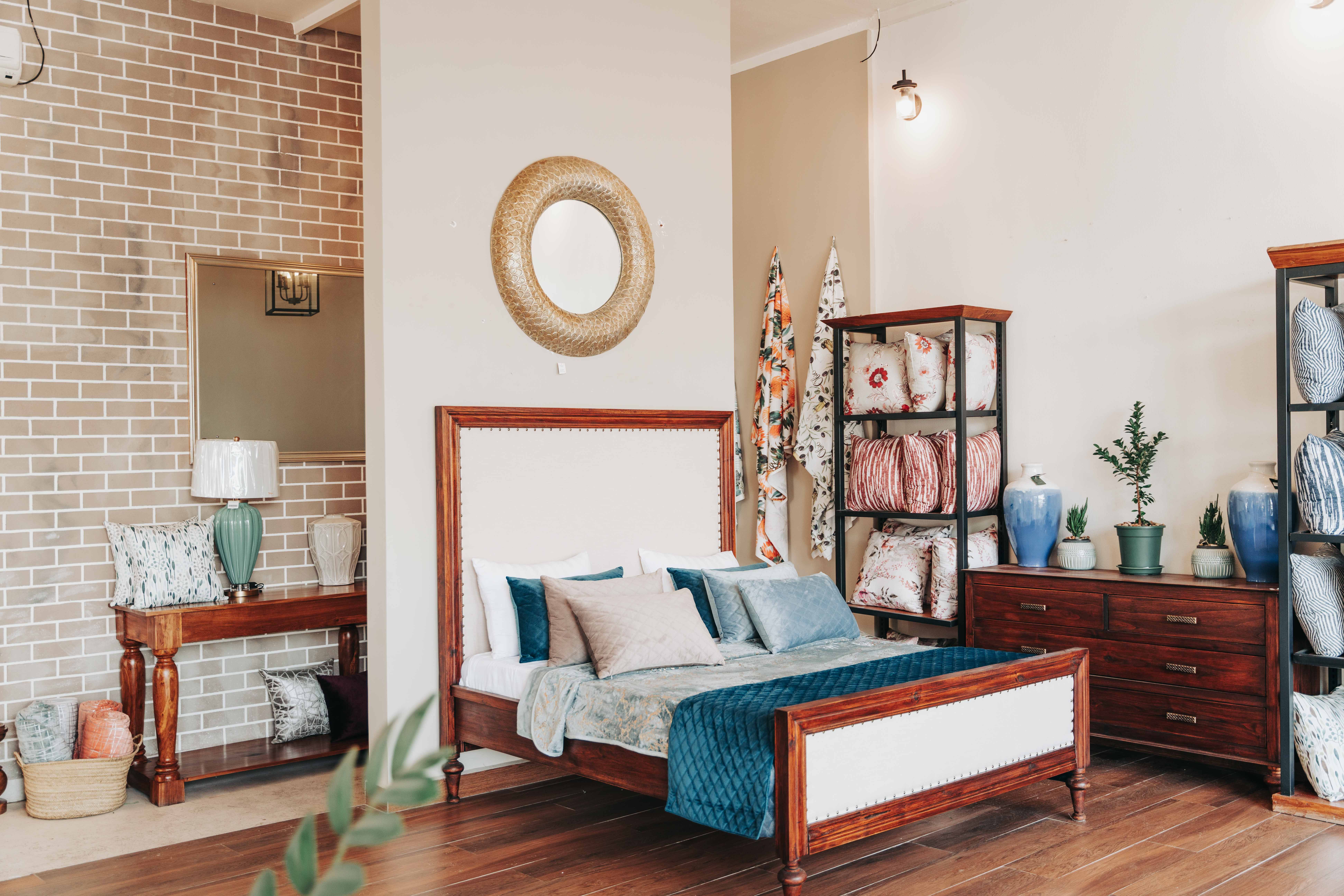 Stylish bedroom interior featuring modern decor, elegant bedding, and vibrant colors.