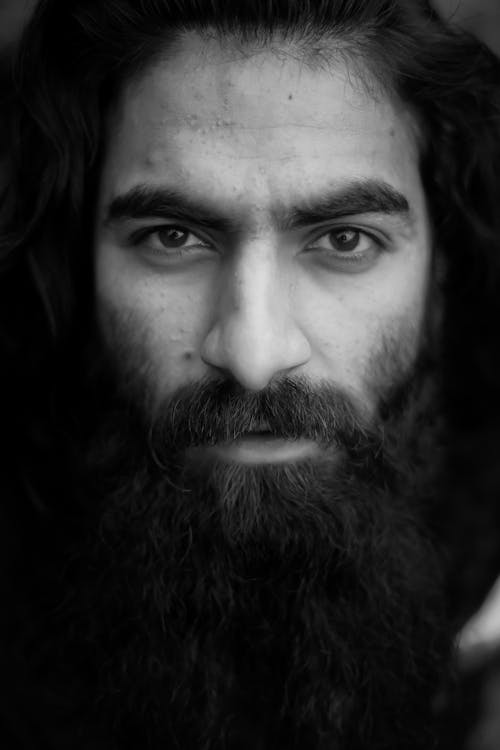 Grayscale Photo of Bearded Man