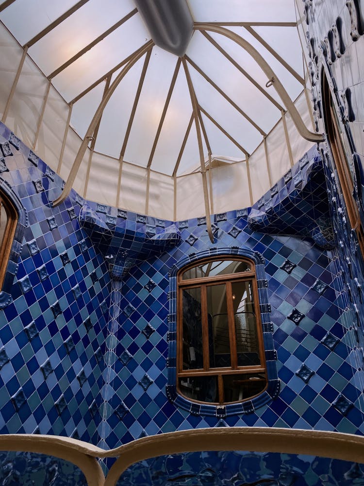 Blue Walls And Glass Ceiling In Building