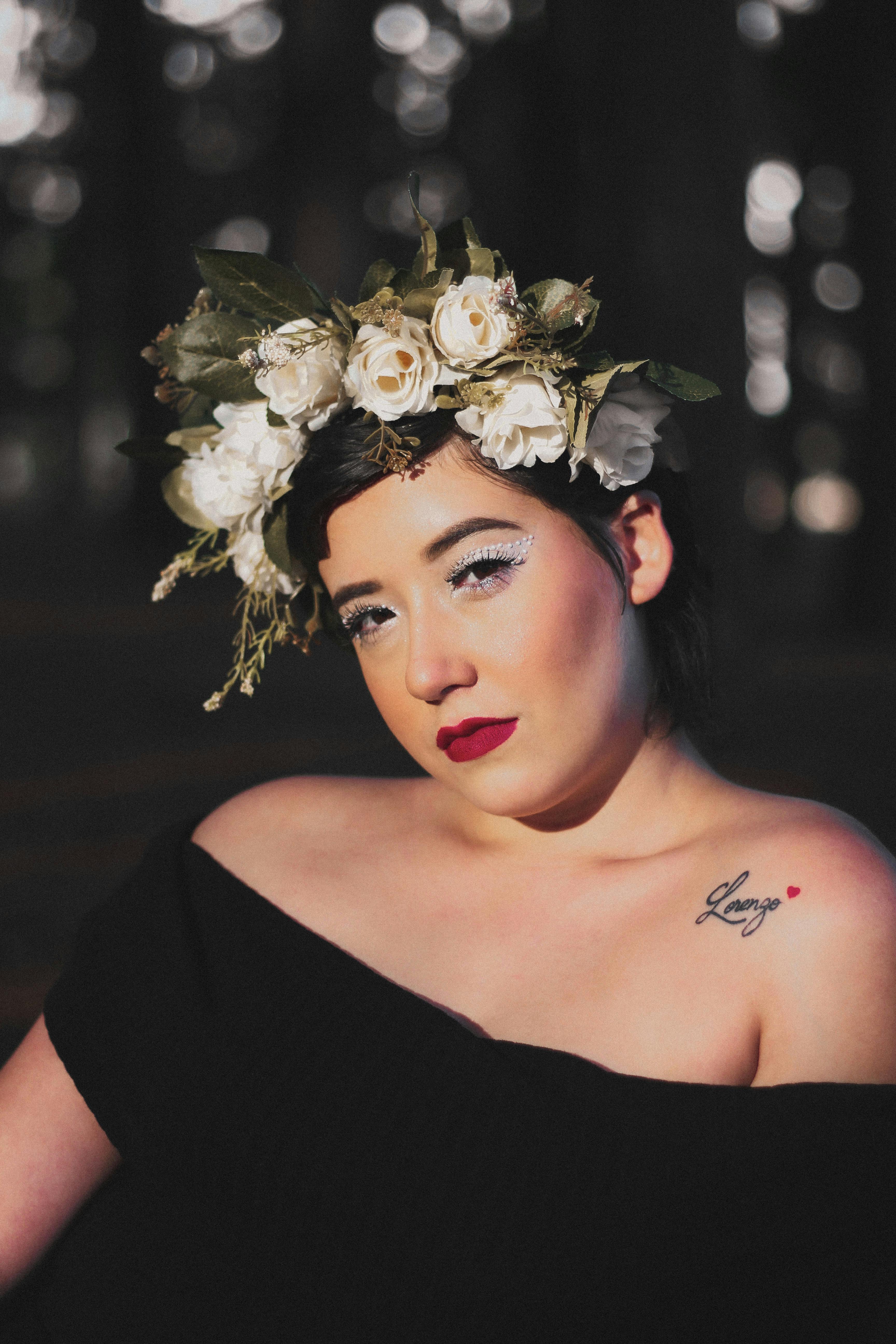 a woman with flowers on her head