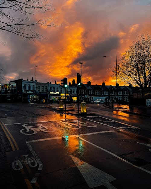 Photograph of a Road in a City During Sunset