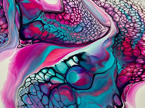 Vibrant close-up of a fluid acrylic abstract painting with intricate patterns and bold colors.