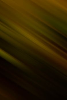 Abstract blurred motion background with warm brown tones and diagonal lines.