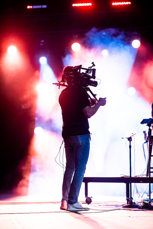 Back View of a Cameraman Onstage