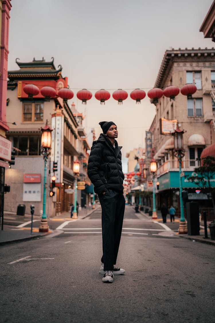 Man Standing On A Street In A China Town