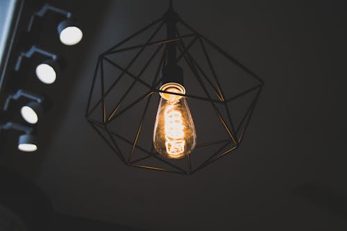 Turned on Black Framed Incandescent Bulb Pendant Lamp