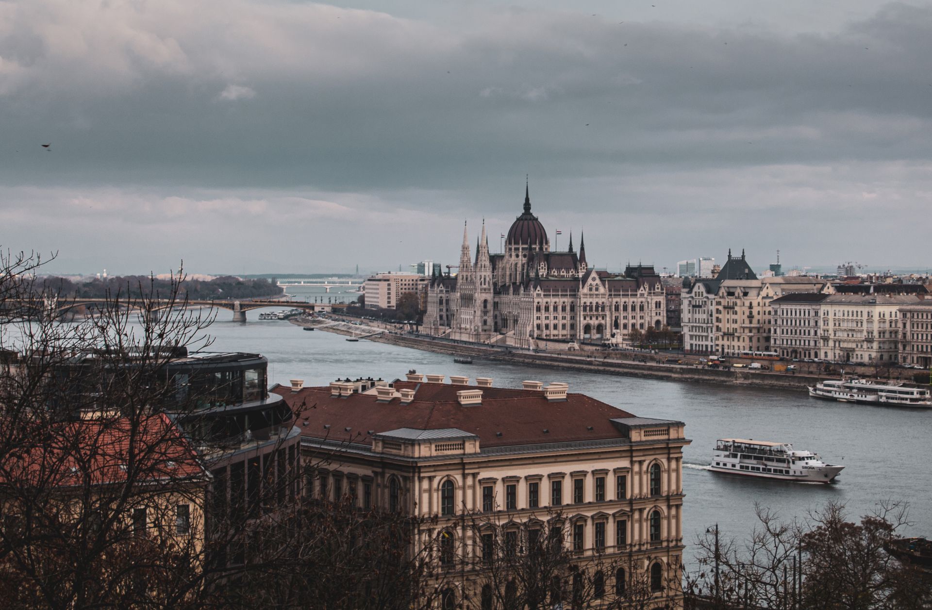 Scenic view of the Hungarian Parliament Building by the Danube River in Budapest, Hungary.
