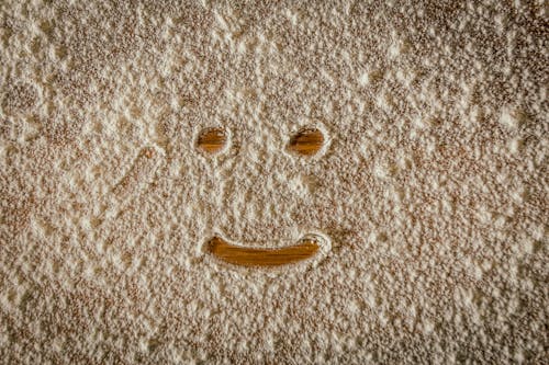 Flour With Smiling Face on Parquet Flooring
