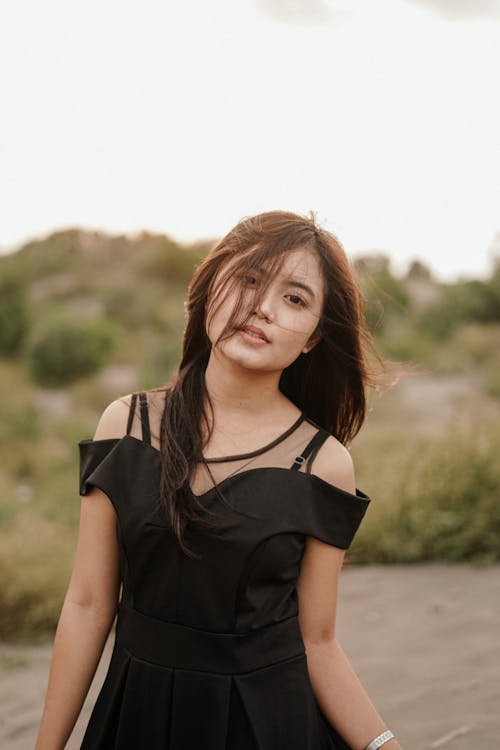 Free Portrait of a Woman in a Black Dress Stock Photo