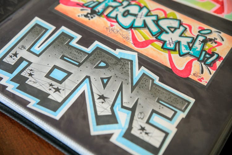 Graffiti Painting Laying On The Table