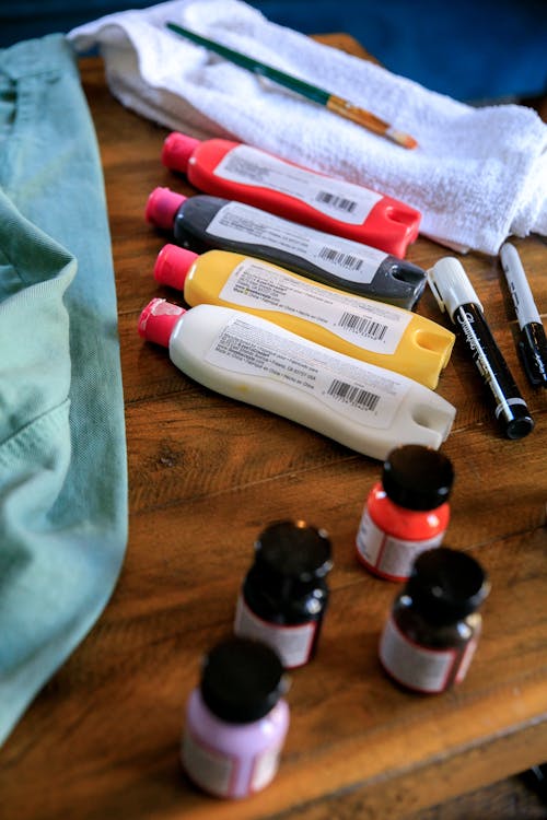 Free Paints and Brushes on the Table Stock Photo
