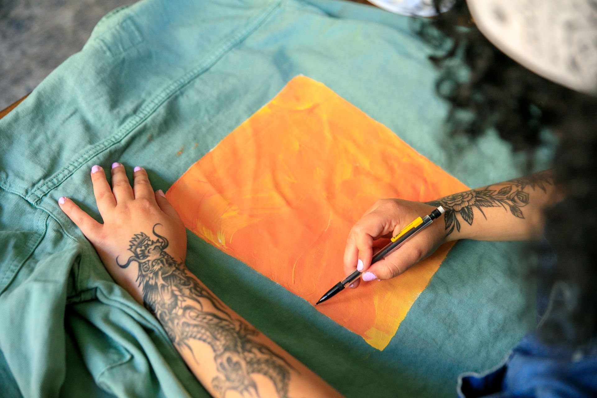 Woman Creating Design for Blouse