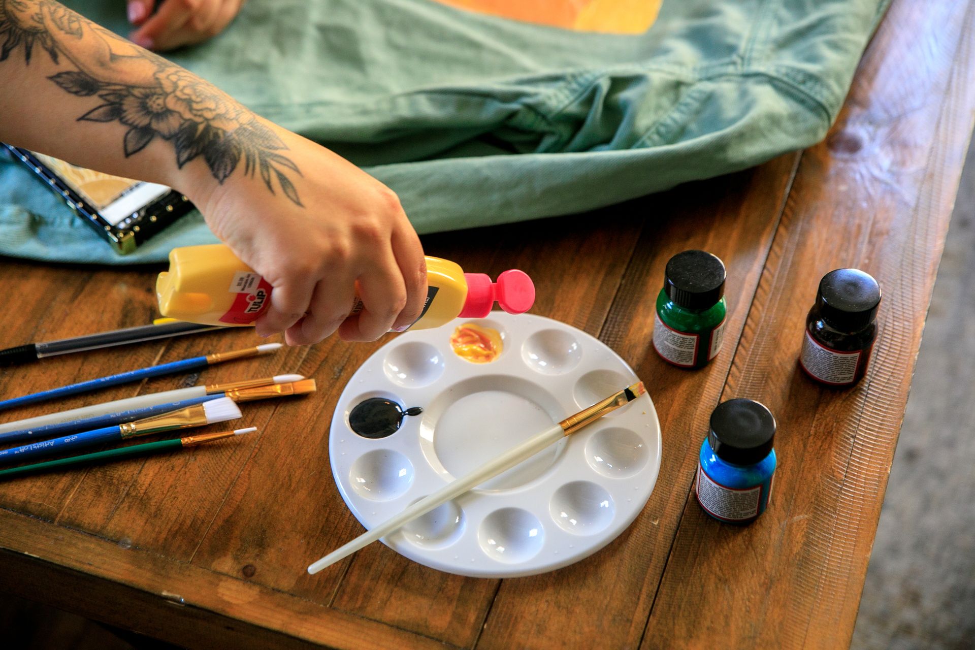 Preparing Paint for Handmade Design on Jacket