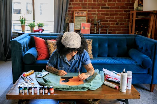 Free Woman Painting on Jacket Stock Photo