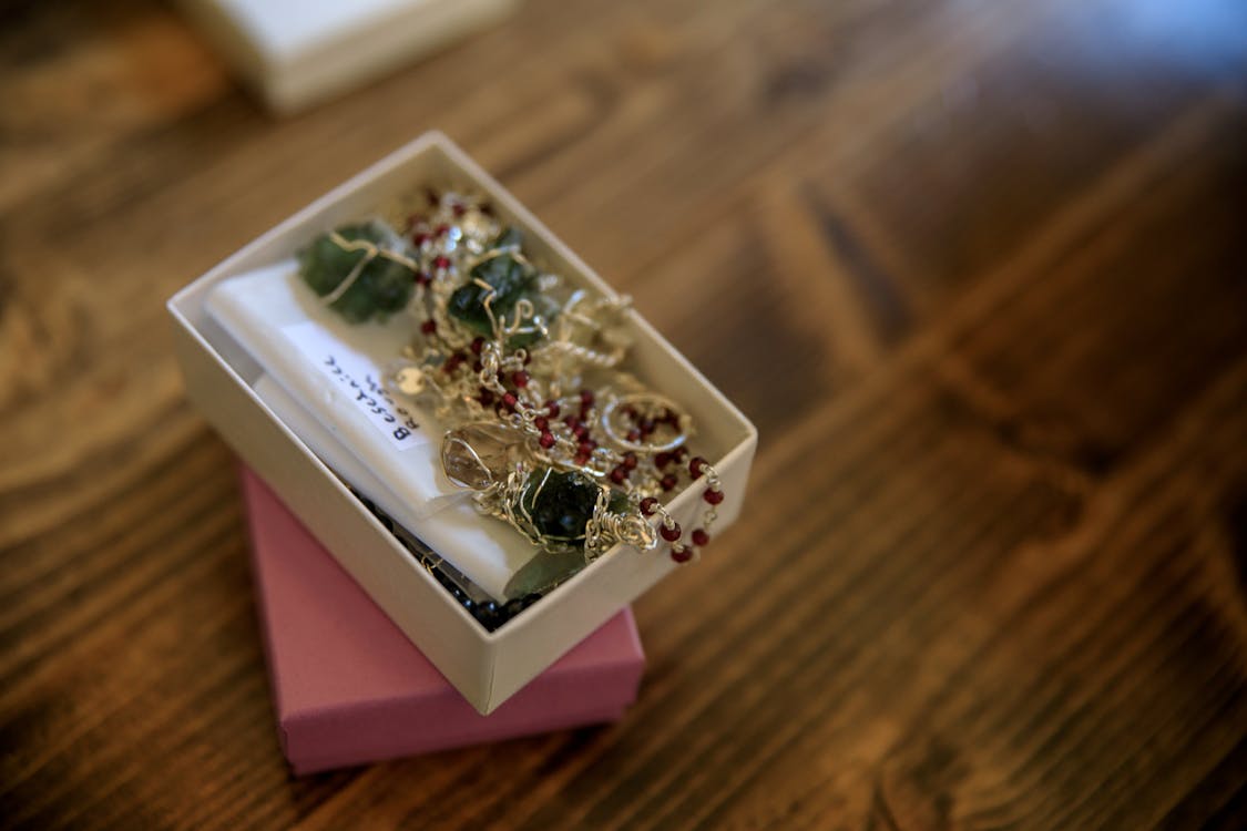 Close Up of Tiny Box with Handmade Jewellery · Free Stock Photo