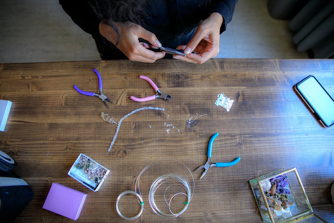 Directly Above View of Woman Making Jewellery