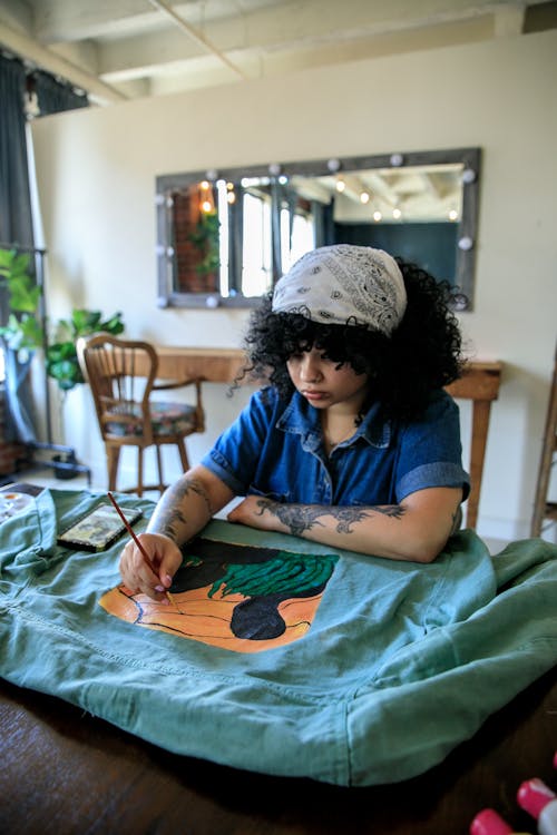 Female Artist Painting on Jacket