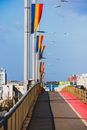A Bridge Lined with Romanian Flags