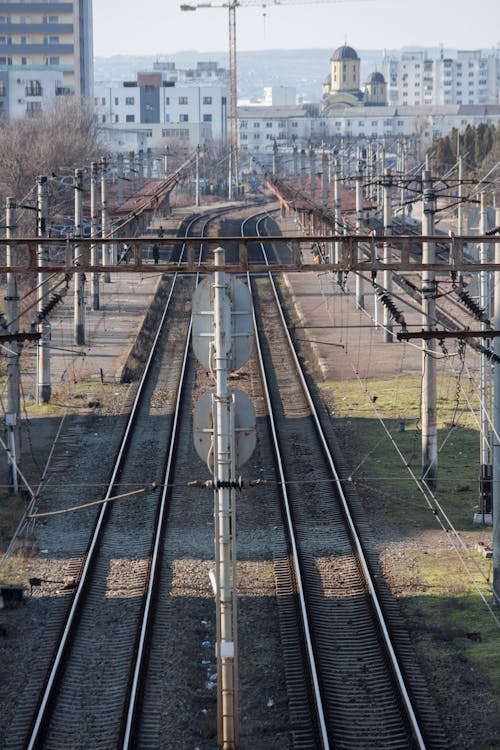Foto profissional grátis de cidade, estação, estrada de ferro