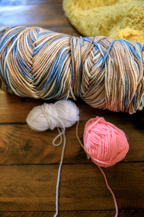 Close-up View of Yarns on Desk