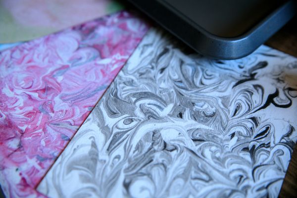 Marbled art paper with pink and grey abstract swirls — RDNE Stock project on Pexels