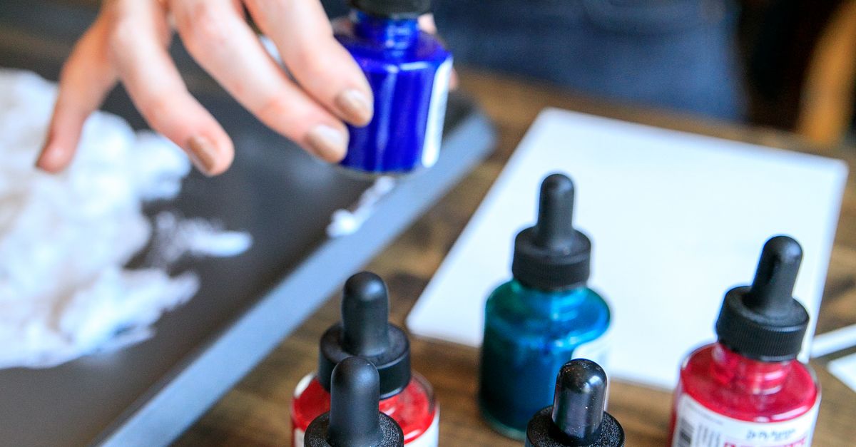 Ink In Hand Close up on Blue Ink in Hand · Free Stock Photo