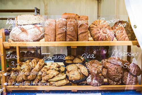 Free Brown Wooden Rack With Baked Bread Displayed Stock Photo