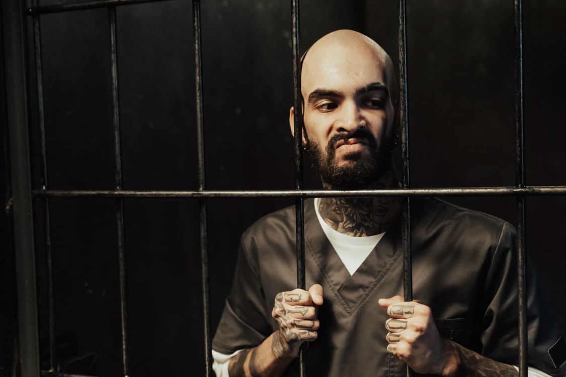 Bald Man in Jail · Free Stock Photo