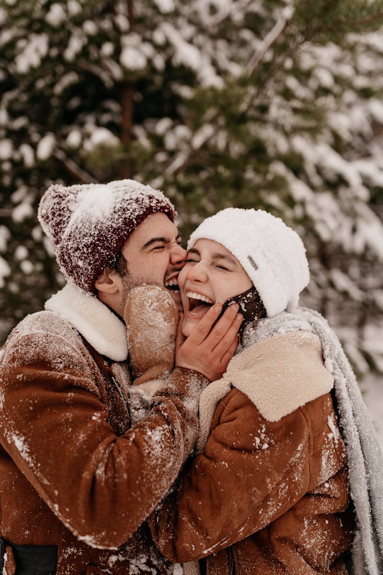 Smiling Couple On Snow