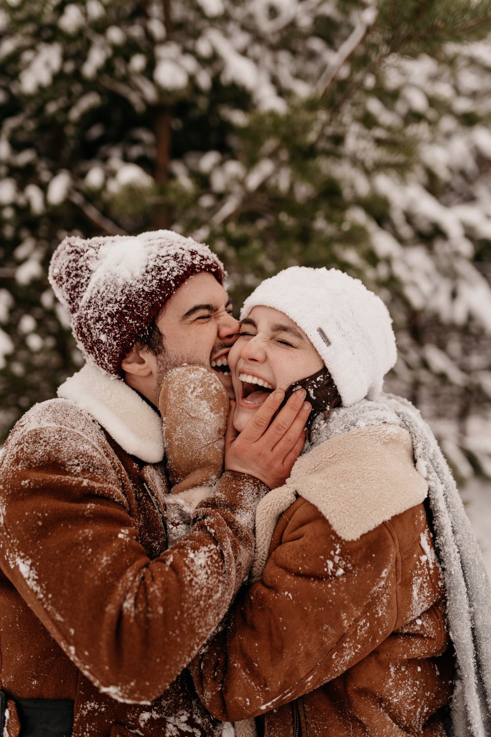 Smiling Couple on Snow · Free Stock Photo