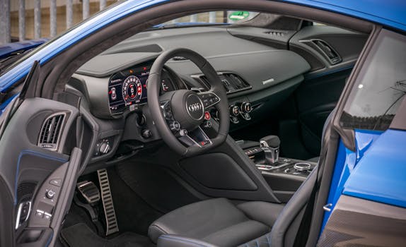 Explore the sleek design and advanced features of a luxury sports car interior.