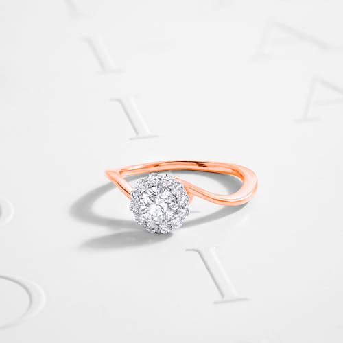 Free Diamond Ring on White Surface Stock Photo