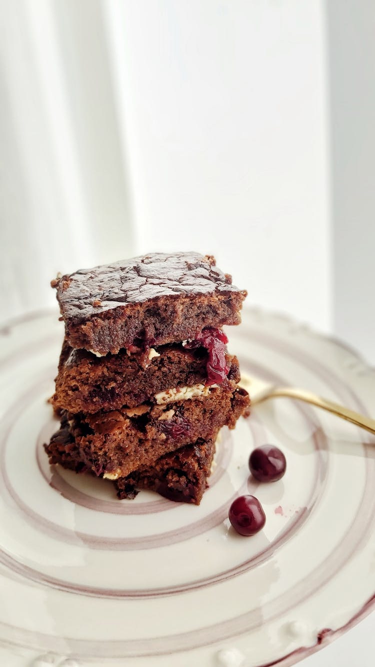 Stacked Brownies On Plate