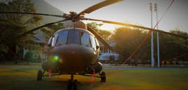 Black Chopper on Green Grass Lawn during Daytime