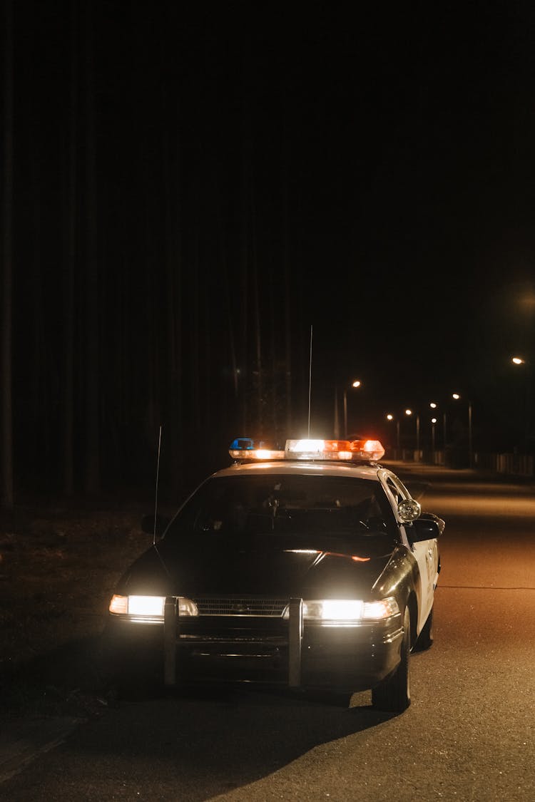 Black And White Police Car On Road