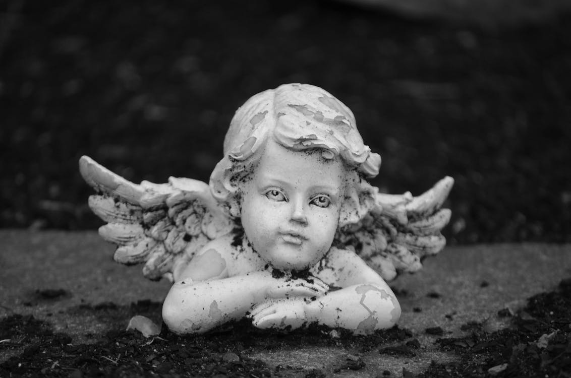 Grayscale Photo of Angel Figurine · Free Stock Photo