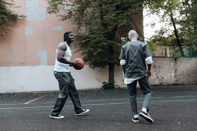 Two Men Playing Basketball