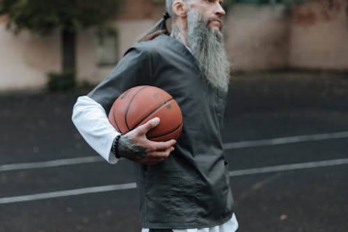 Kostnadsfri bild av basketboll, basketspelare, håller