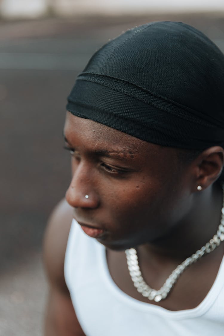 Man In Bandana And Tank Top