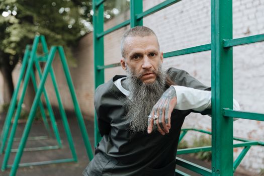 Man with Beard on Yard