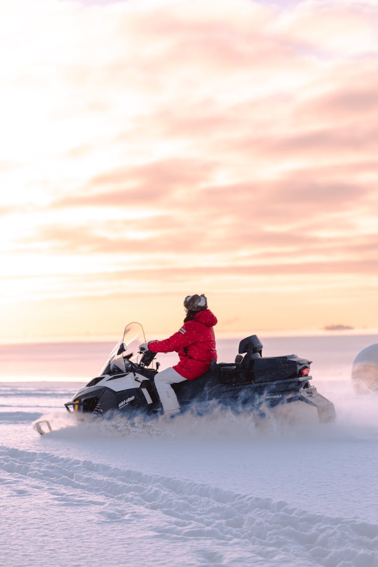 Person On Snow Scooter