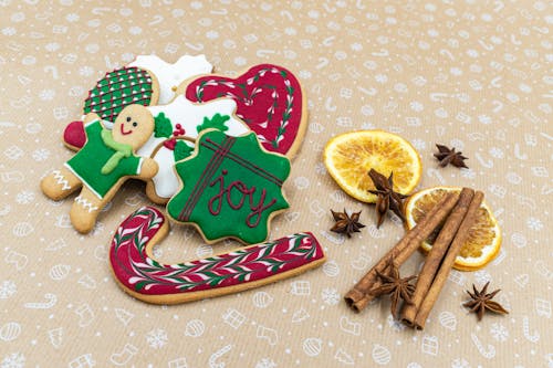 Christmas Cookies Beside Cinnamon Sticks