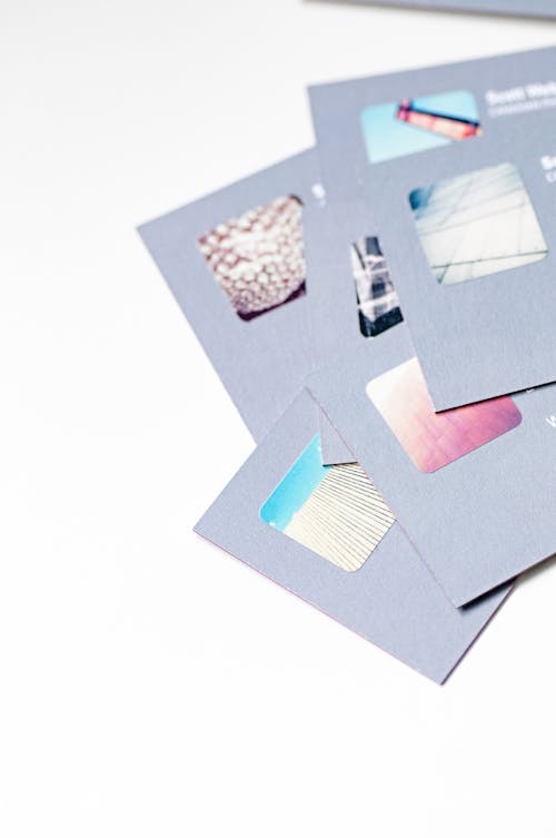 Free Photo of Gray Cards on White Surfafce Stock Photo