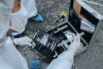 Forensic expert examining evidence — photo by cottonbro studio on Pexels