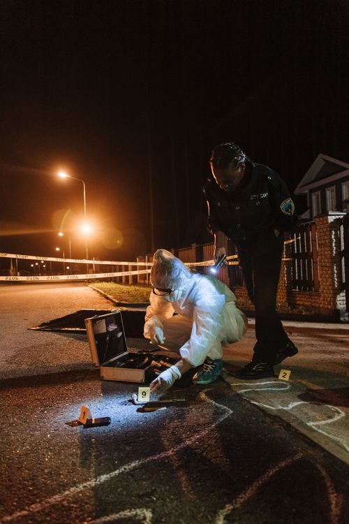 Police Inquiry Police Officers Investigating the Crime Scene · Free Stock Photo
