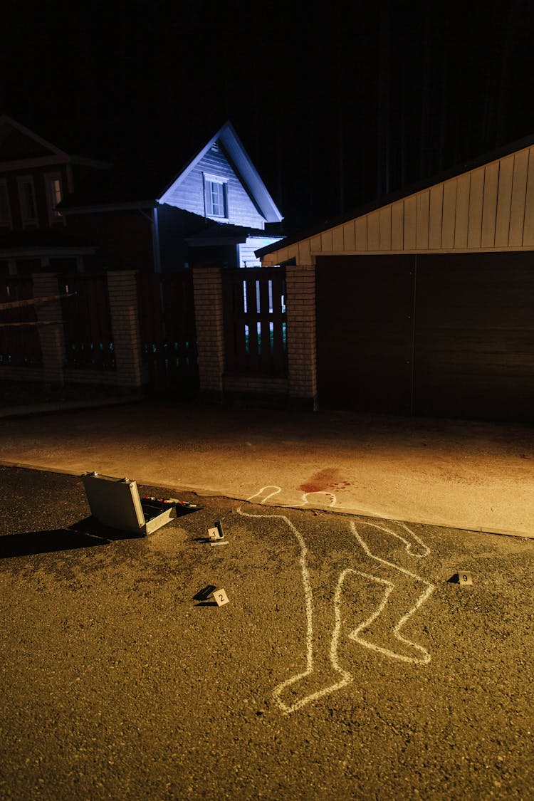 Crime Scene Near A Wooden House 